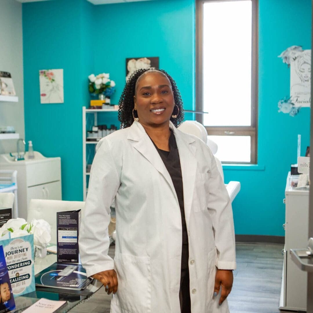 Smiling pharmacist in a bright pharmacy environment.