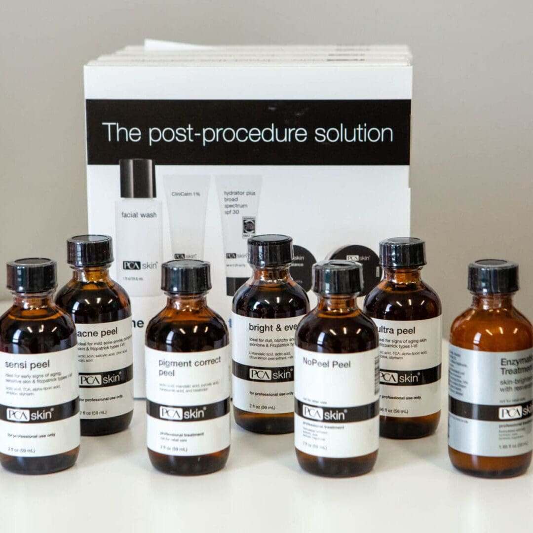 Set of amber glass bottles labeled as a post-procedure solution.